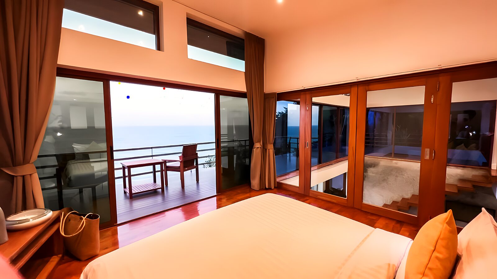 King bedroom opening to a sea-view terrace